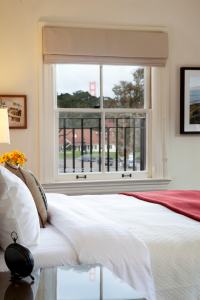 Inn at the Presidio suite with a Golden Gate view in the background. Photo by Paul Dyer.