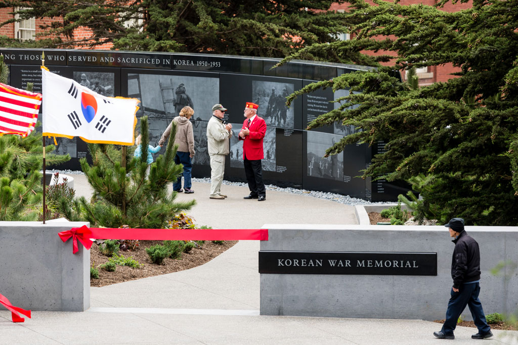 Visitors behind red ribbon at Korean War Memorial