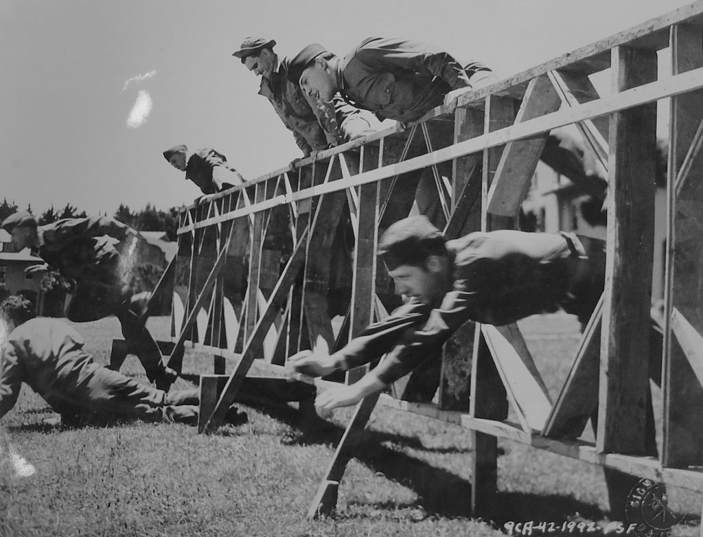 Soldiers at obstacle course finish line