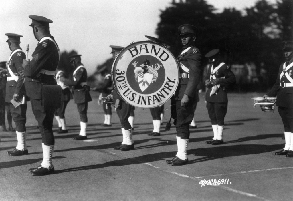 30th Infantry Band with instruments and drum in formation