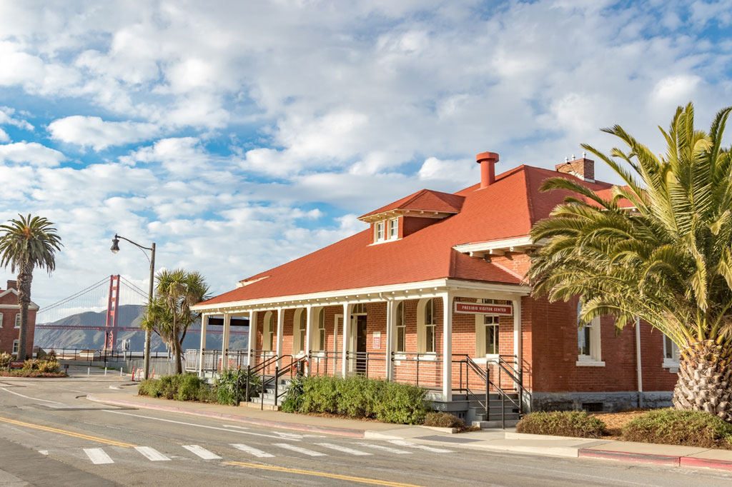 Presidio Visitor Center in 2017 with Golden Gate Bridge in the background