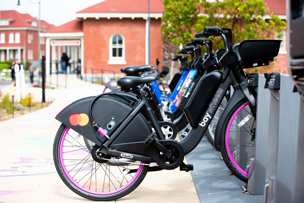 Bay Wheels electric bikes docked by Presidio Visitor Center