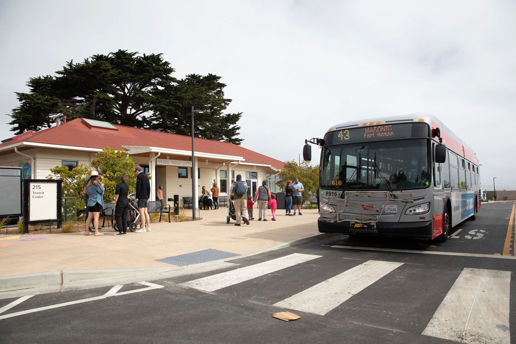 Visitors and Muni bus at Presidio Transit Center
