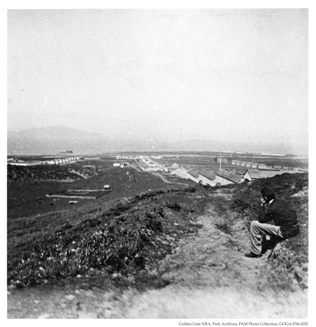 Man on hill overlooking Presidio