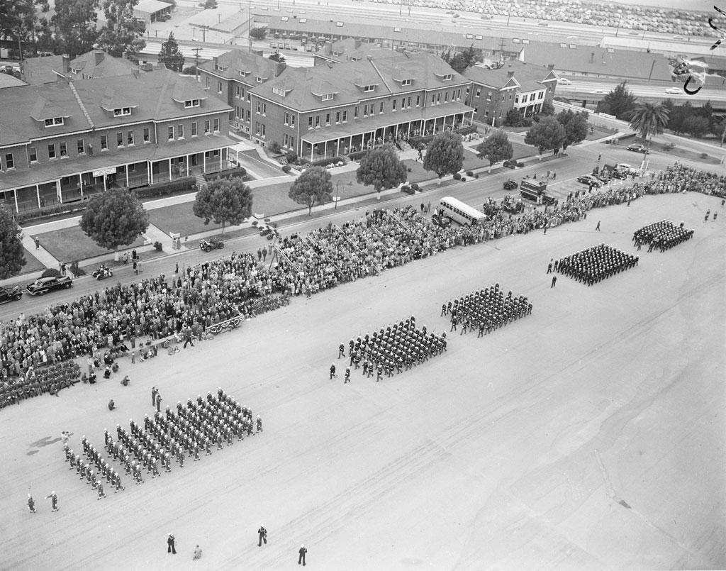 Aerial view of troops drilling on the Main Parade Ground for visitors