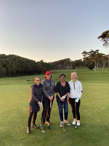 Four members of the Womens Golf Club on the green