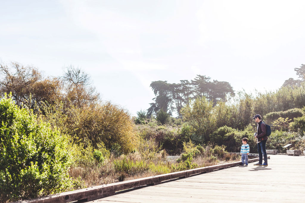 Man and child on El Polin boardwalk