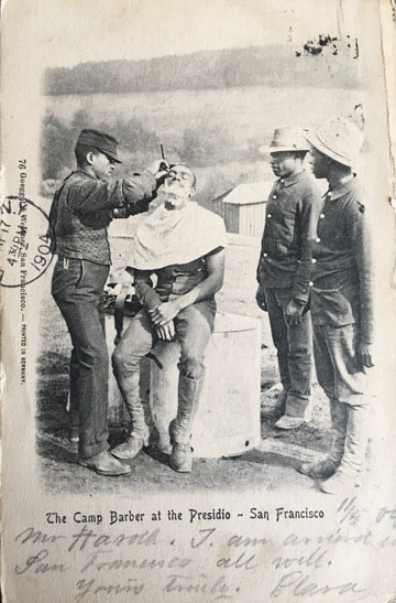 An African American soldier getting a shave from the camp barber. Postmarked May 11, 1904, so possibly 9th Cavalry, Buffalo Soldier.