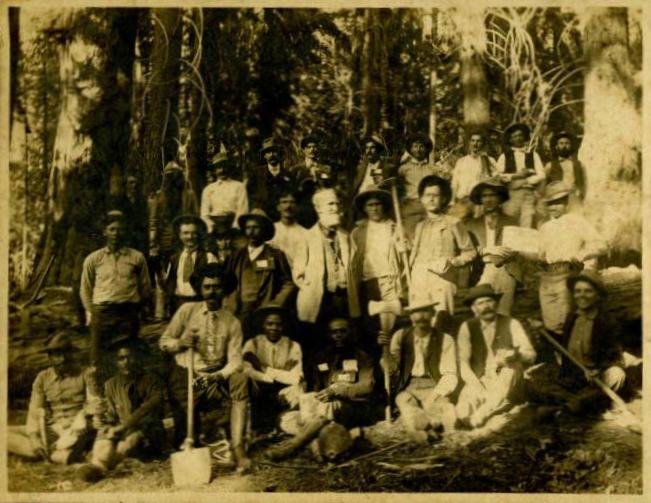 Captain Charles Young at Sequoia National Park with civil engineer George Welch and members of Welch's work crew. Ninth Cavalry soldiers in front row. Image courtesy National Afro-American Museum and Cultural Center.
