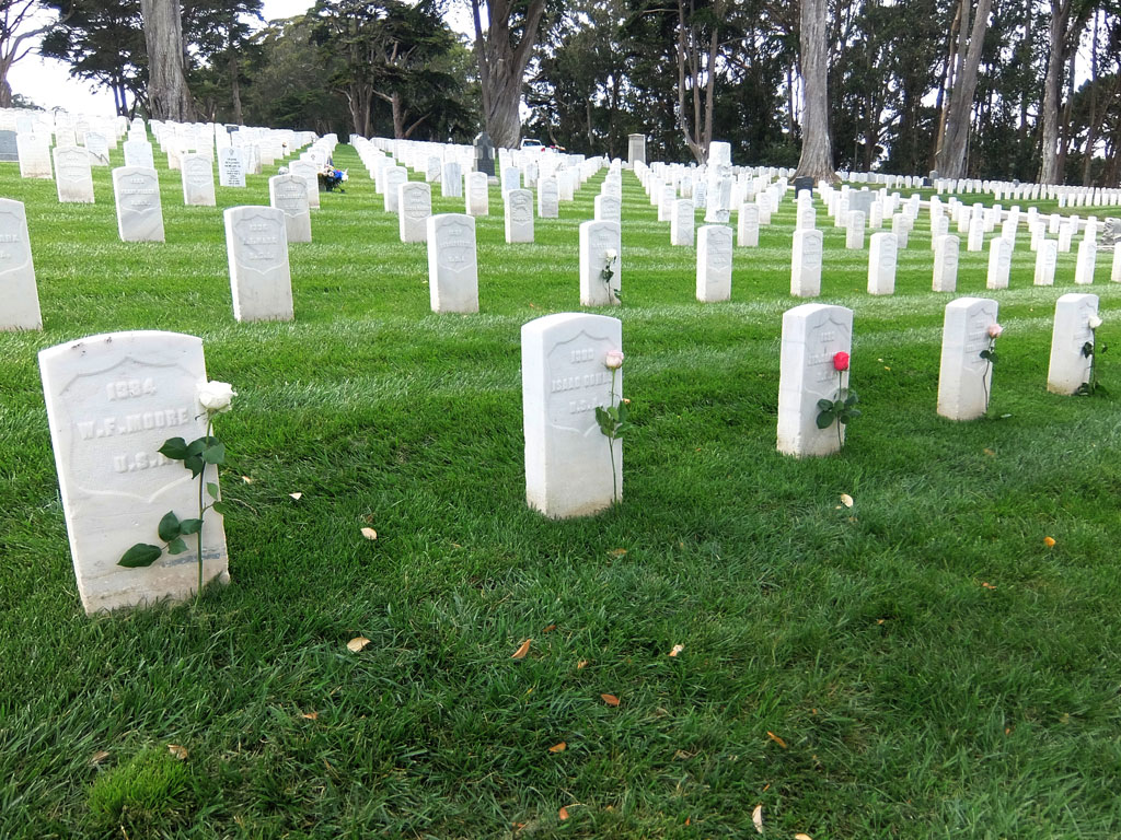Graves of Buffalo Soldiers marked with flowers in 2016 on the 150th anniversary of the authorization of the units. Image courtesy Presidio Trust.