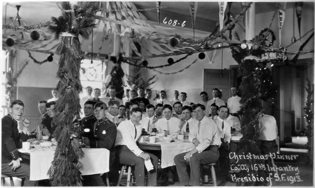 Black and white photo of 16th Infantry having Christmas Dinner in 1913.