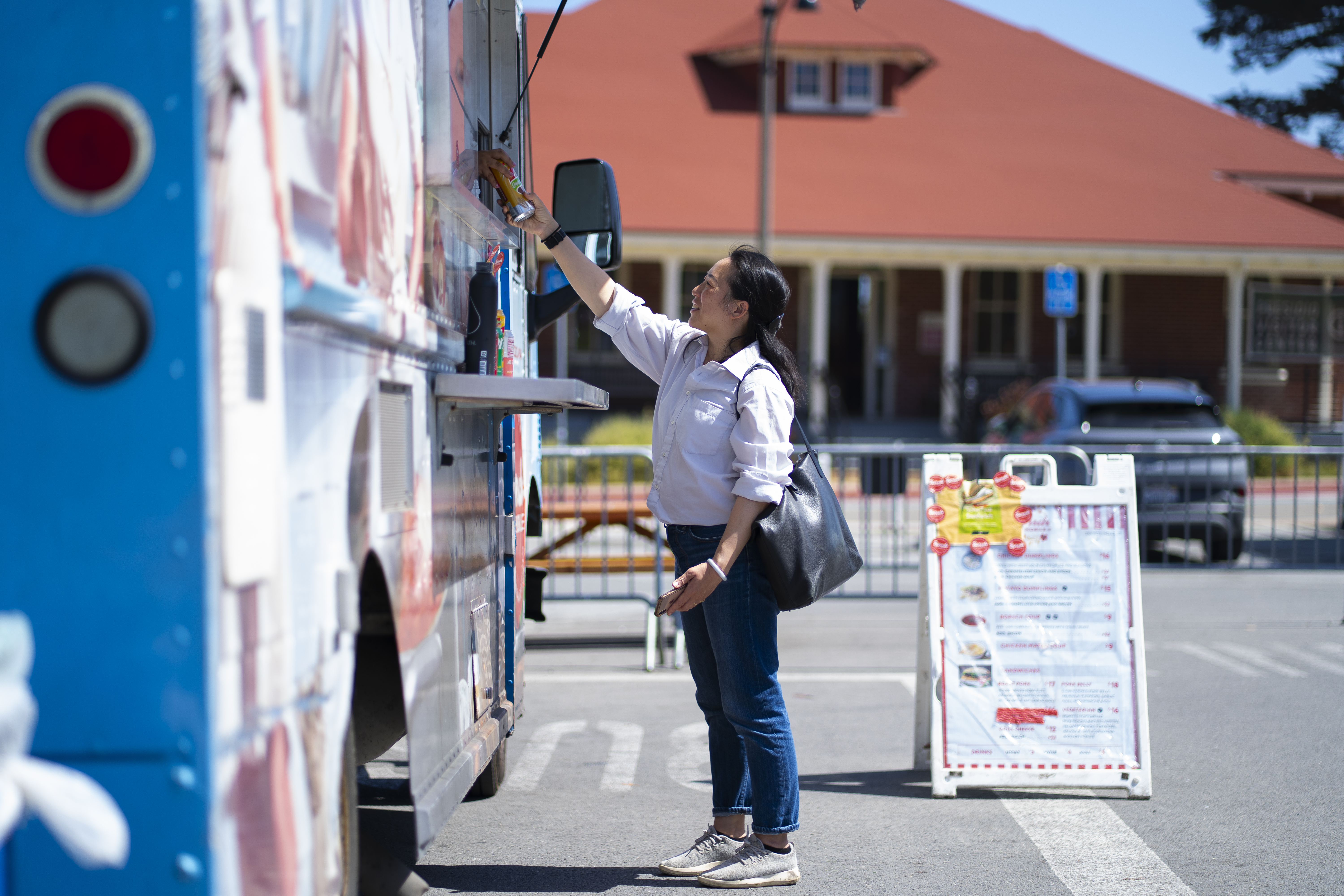 woman ordering food at a pop up food truck