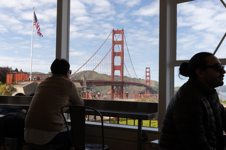 Customers at the Roundhouse Café looking at the Golden Gate Bridge view. Photo by Myleen Hollero.