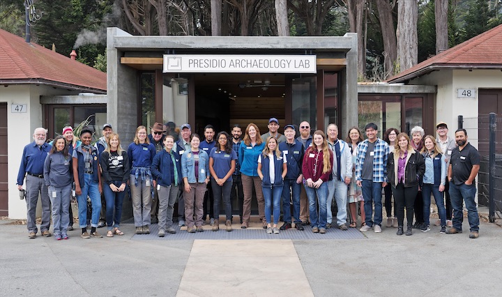 Staff and volunteers standing in front of the Presidio Archaeology Lab.