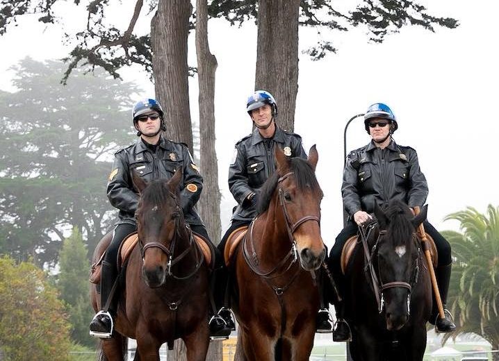 Three U.S. Park Police Officers on horses. Photo by Moanalani Jeffrey.