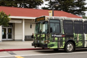 A Presidio GO Shuttle bus sits in front of Presidio Transit Center.