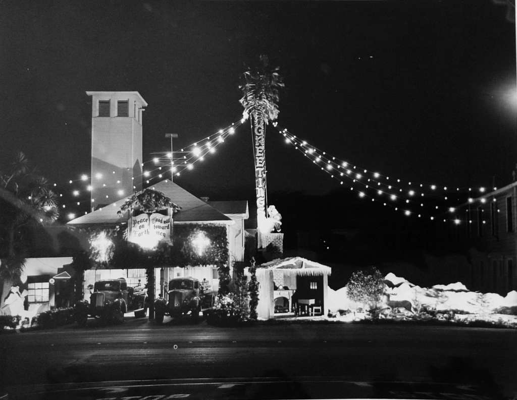 Presidio Firehouse decorated for the holidays in 1951 with a giant light-up “Greetings” sign.