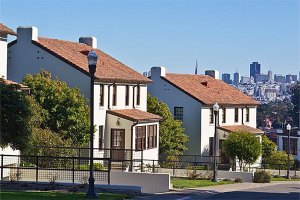Storey Neighborhood homes with the San Francisco skyline in the background.