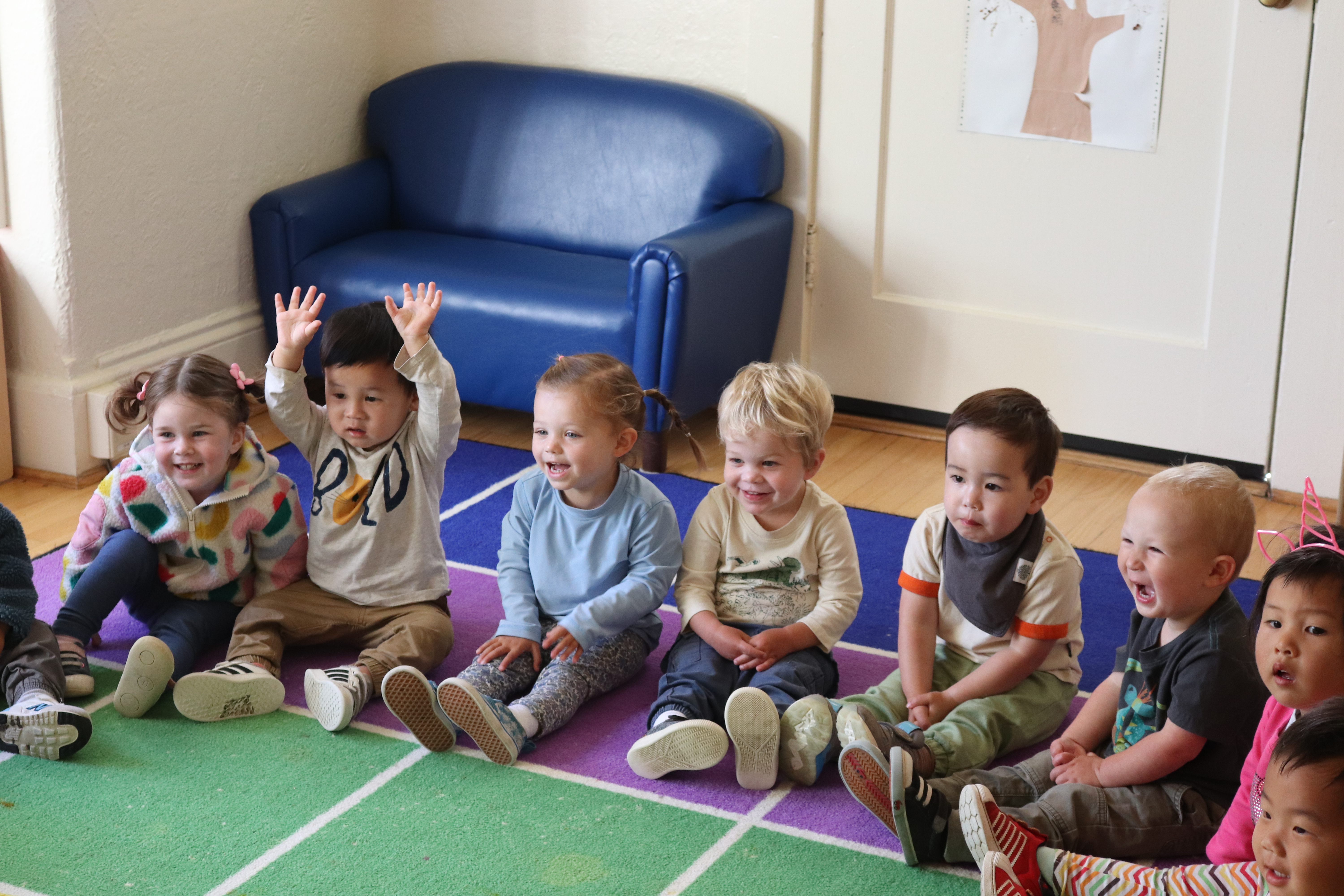 little kids participating in sing time at Little Bee School