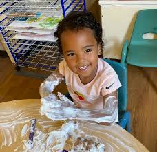 Little child enjoying playtime at Serra Preschool